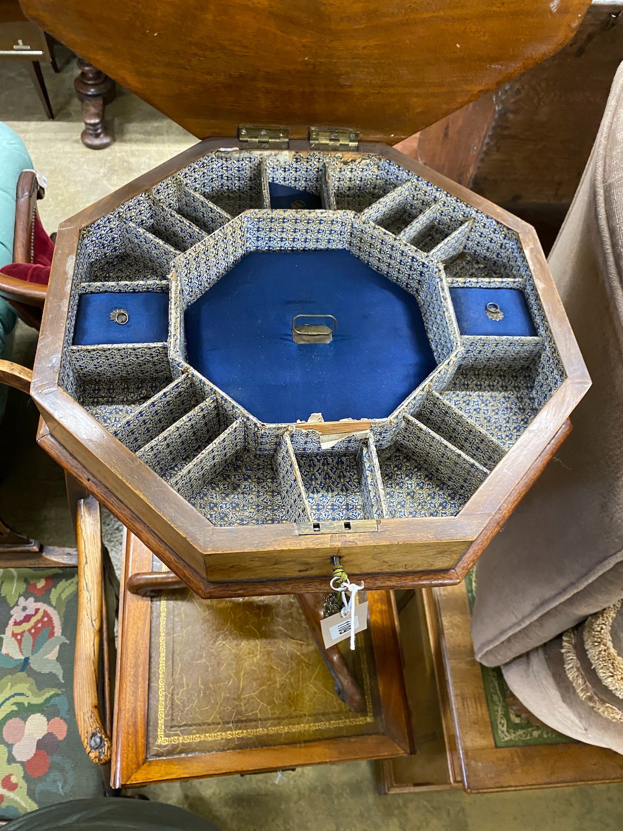 A Victorian marquetry inlaid octagonal trumpet work table, width 40cm, height 70cm